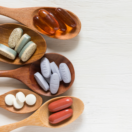 An arial view of an assortment of vitamins.