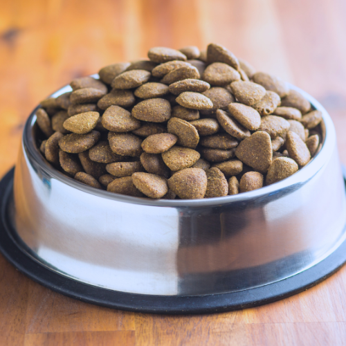 A full bowl of freeze dried dog food.